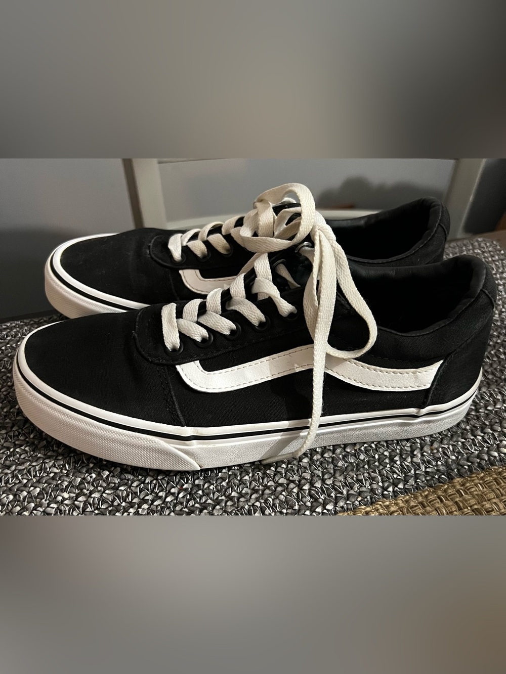 Vans Black Canvas Low-Top Sneakers with White Side Stripe. Size for Women is 7.5
